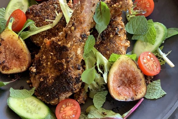 Sun-dried Tomato Pesto-Dukkah Crumbed Lamb Cutlets served with a salad of figs, cherry tomato cucumber and salad greens. by cookingmealsforone one.com